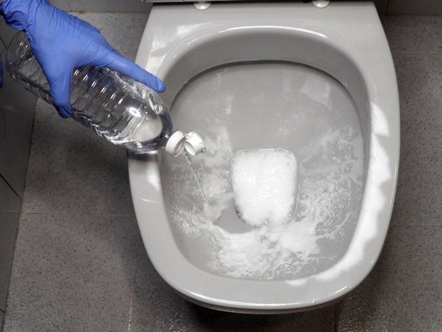 Toilet with baking soda